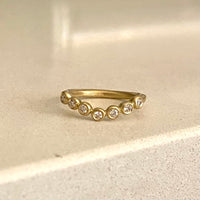 Annie Fensterstock 18K Gold Curved Band with Seven Bezel-Set Diamonds